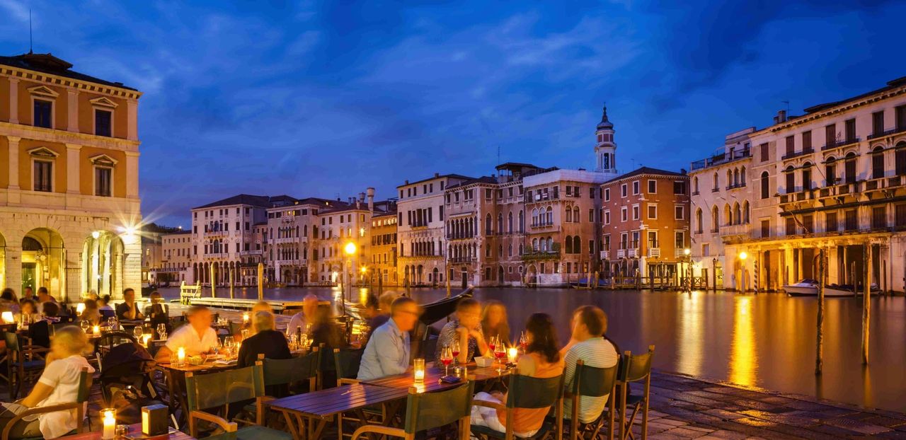 Canal-side wine and cicchetti at Osteria Bancogiro near the Rialto Market. Canal-side wine and cicchetti at Osteria Bancogiro near the Rialto Market.