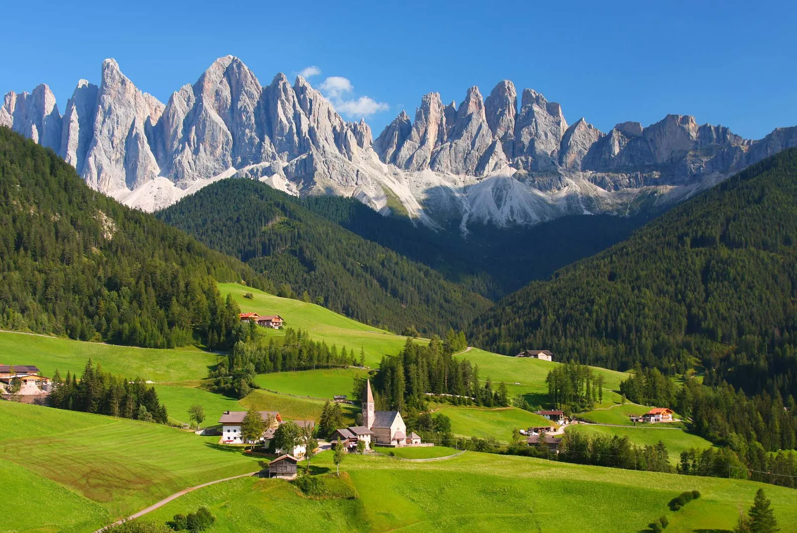 Dolomites-Italian-Alps Alpine village nestled in mountains.